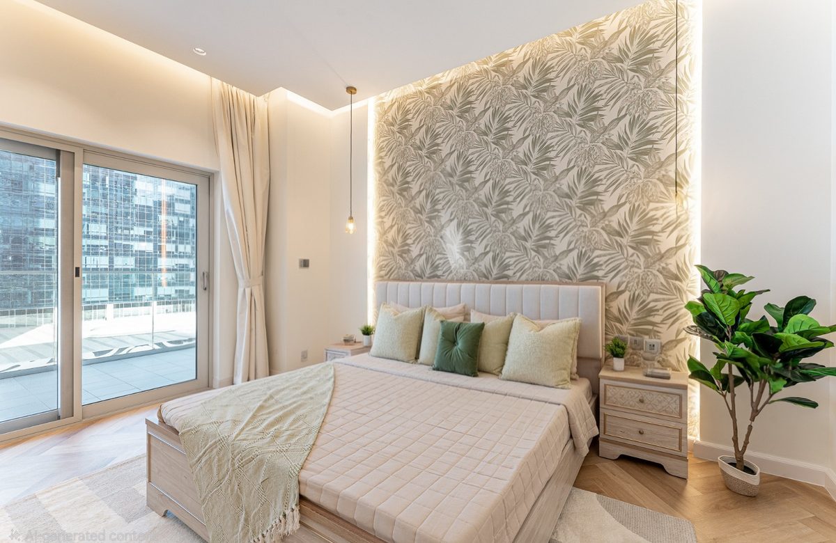 Master suite with palm accent wall